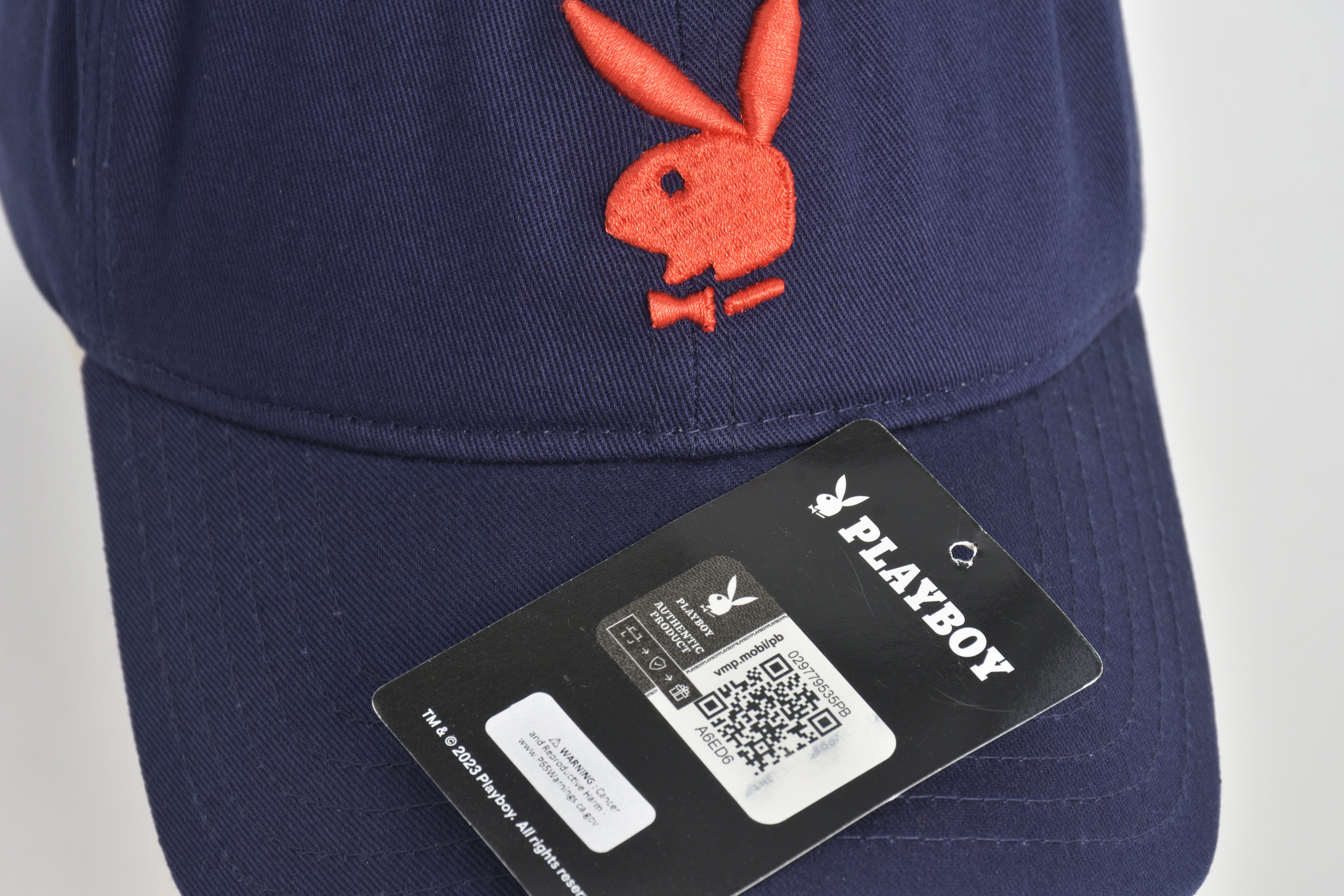 Concept One Playboy Dad Hat, Cotton Twill Adjustable Baseball Cap with Curved Brim